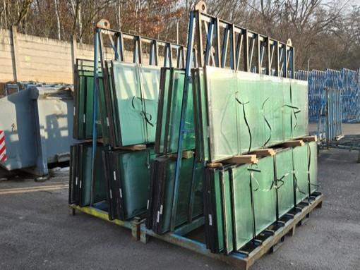 End-of-life glazing, neatly separated from frames and securely stored in return stillages on our AGC CZ sites.